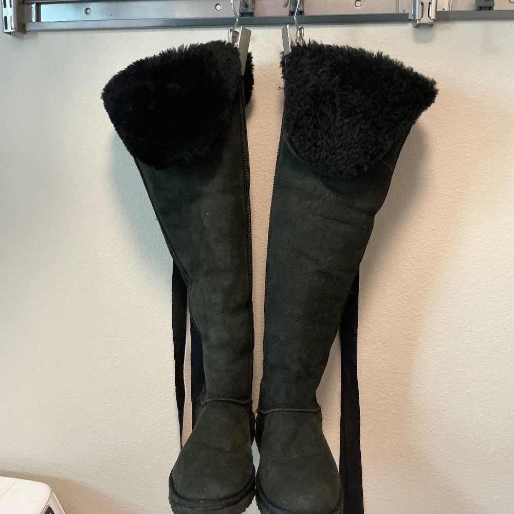 Love Australia knee high black suede shearling lined boots.